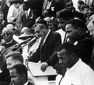 August 28, 1963 -- George Raveling, lower right, as MLK delivers his famous "I Have A Dream" speech during the March on Washington